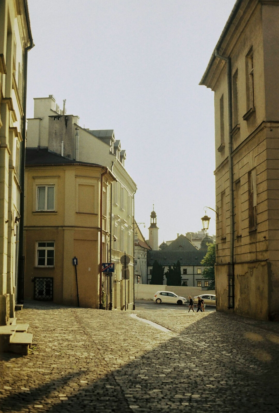 Narrow cobblestone street in a small Polish town